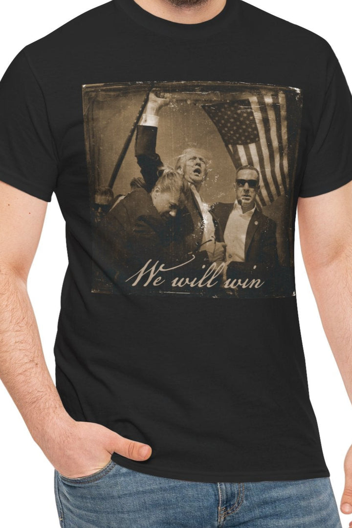 black shirt with Trump's fist in the air. the words "we will win" at the bottom.