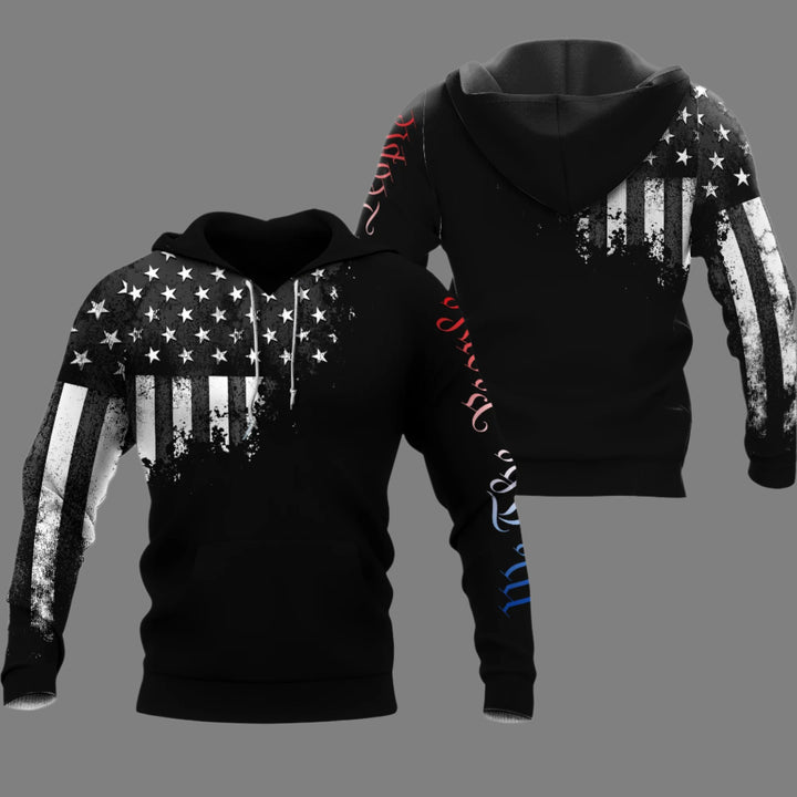 black hoodie features a striking white and black American flag design on the left arm.